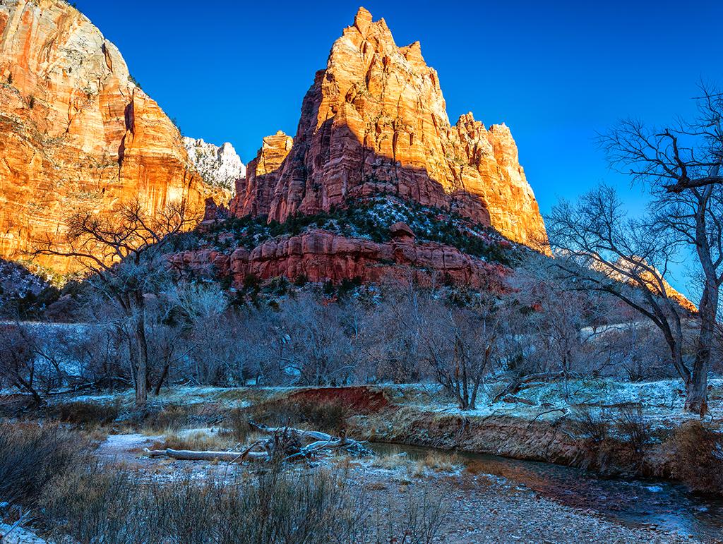 A frosty winter morning by the Virgin River at the Court of the Patriarchs, Zion National Park / Rebecca Latson