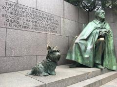 A bronze sculpture of Franklin Delano Roosevelt and his beloved dog Fala