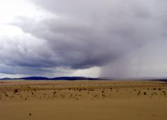 Storm clouds in a vast sky over the immense dunes at Kobuk Valley National Park