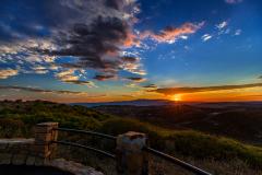 A colorful sunrise with mountains and clouds at Park Point overlook in Mesa Verde National Park