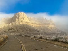 Driving up the summit rock in a misty fog in winter, Scotts Bluff National Monument
